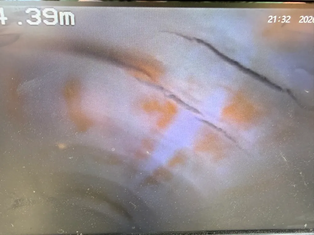 CCTV internal camera showing pipe crack