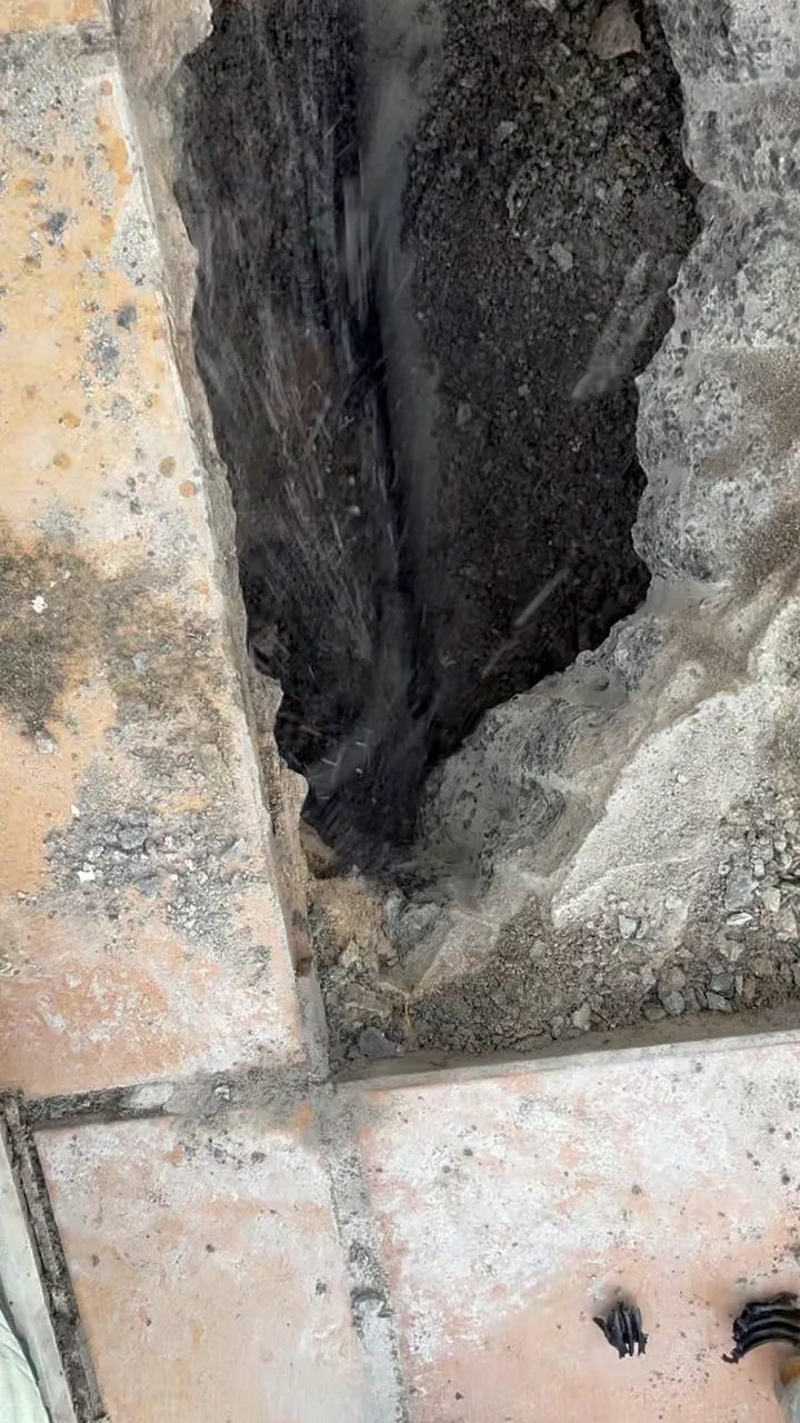Excavation revealing active water leak
