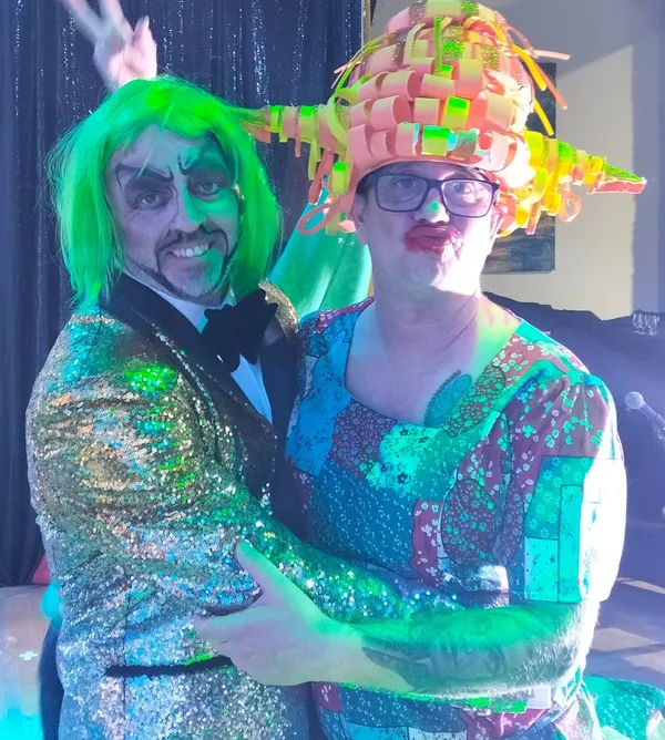 Pete and Dave in green pantomime costumes backstage at Finchy Fairytales