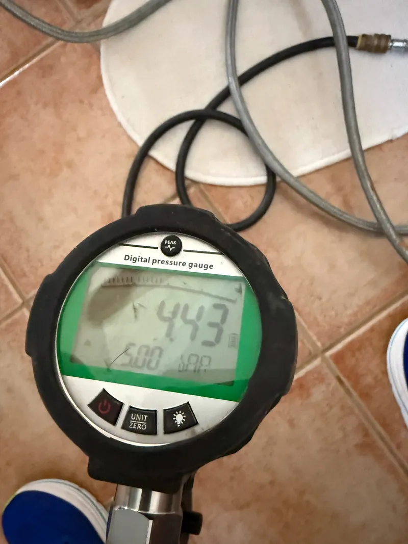 Digital pressure gauge connected to water system