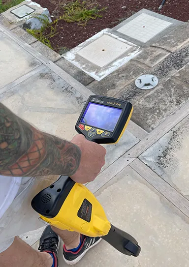 Canary Detect technician with pipe location equipment